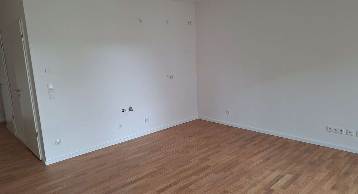 Wohnzimmer mit intergrierter Küche